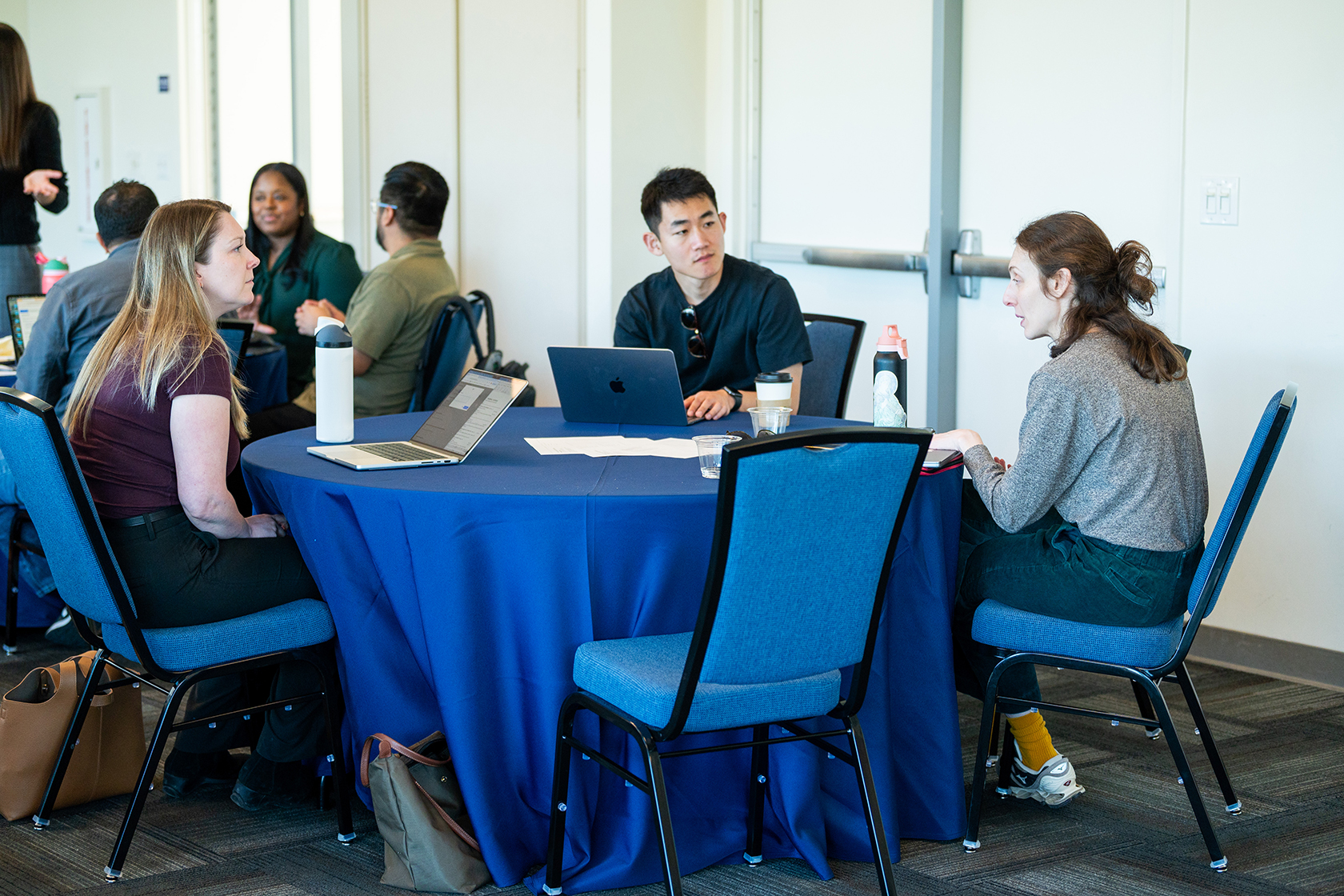 several people seated having a discussion
