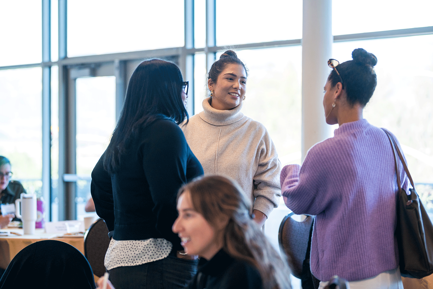 several people standing and conversing